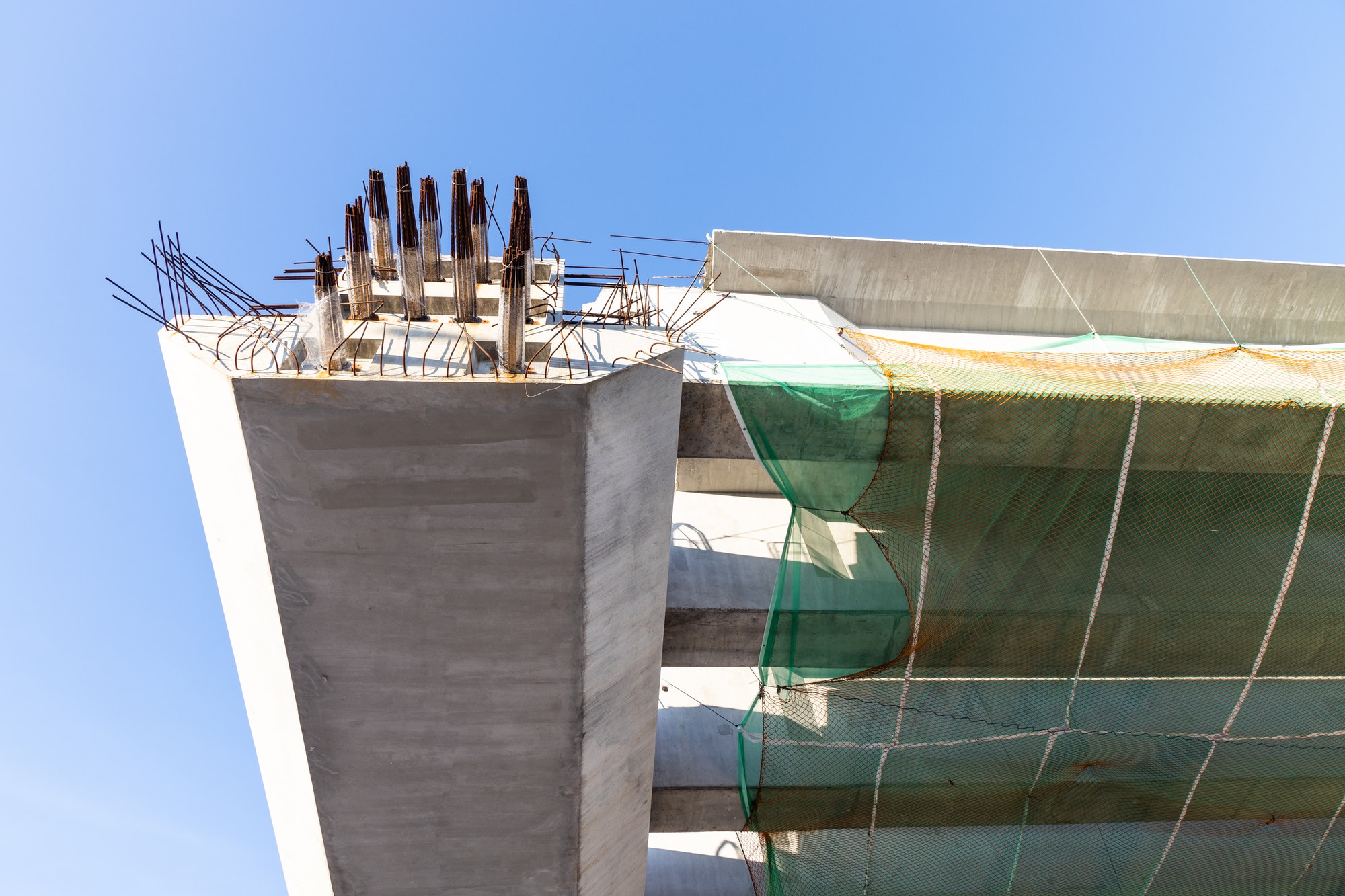 Close-up of concerete beam joints in highway overlay bridge construction
